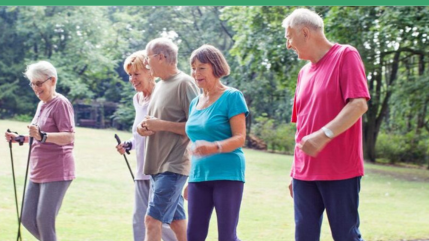 group of older people walking and chatting outside