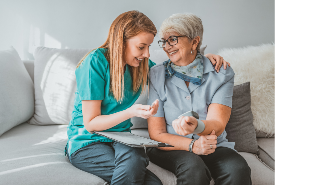 one woman taking another womans blood pressure