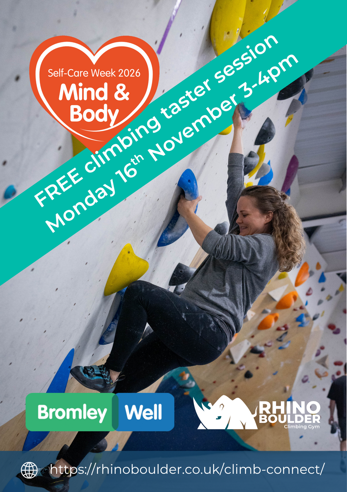 young woman on a short climbing wall. 