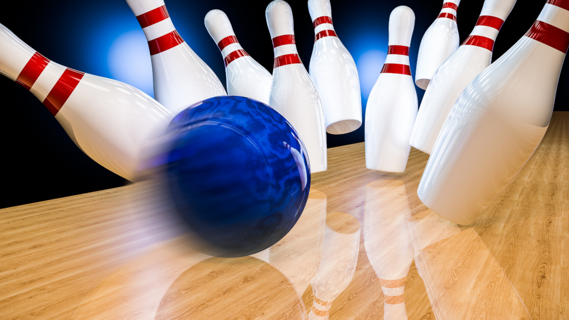 blue bowling ball hitting skittles