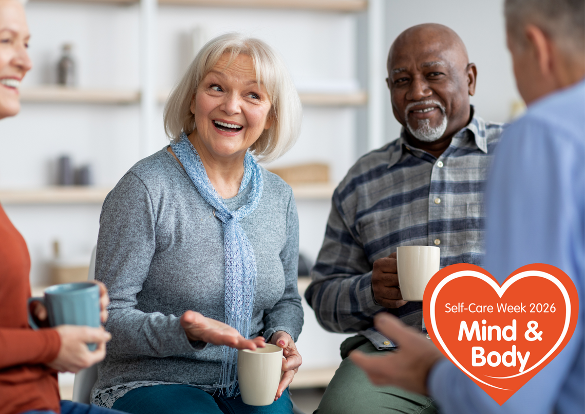 4 people with coffee, happily chatting