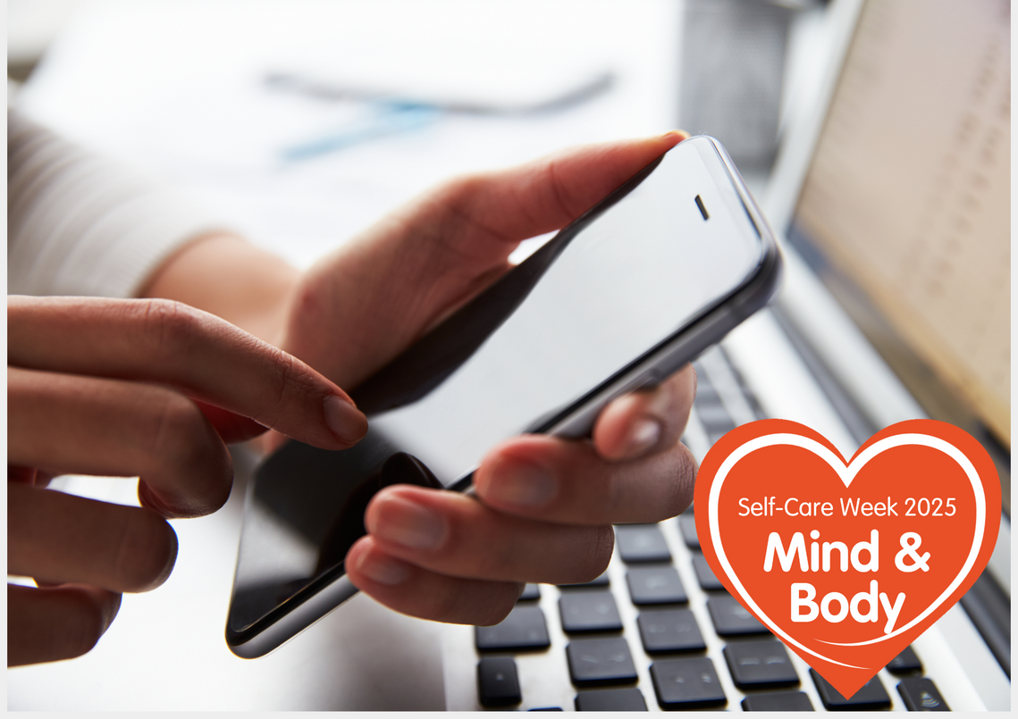 one person using a mobile phone and laptop