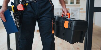 handyperson with tool belt