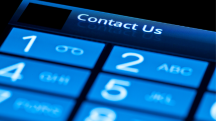 close up of a digital phone screen showing numbers and a contact us option