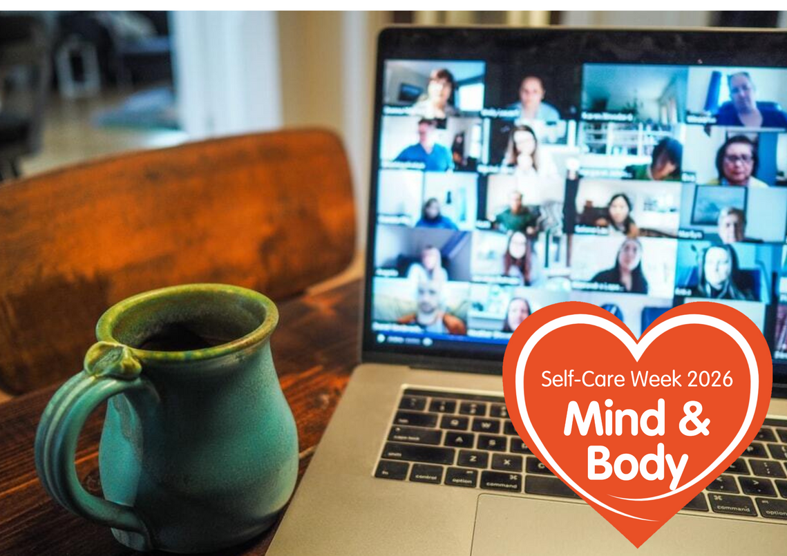 person looking at their laptop showing a people on an online meeting. theres a coffee cup