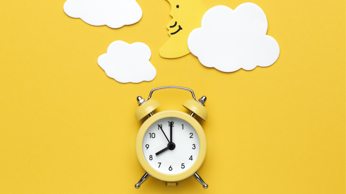 alarm clock and yellow moon