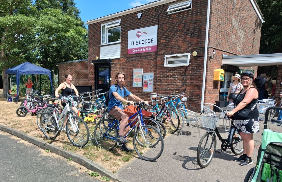 cyclists in a park about to set off
